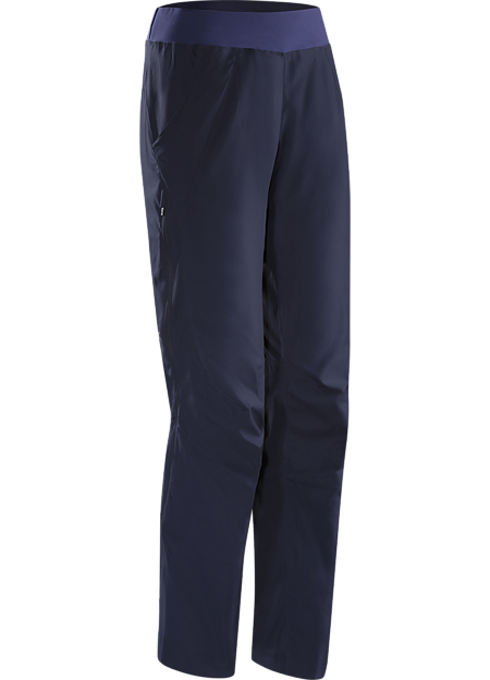 Solita Pant Women's Light, full coverage, warm-up/cool down pant with 3/4 length side zips that enable easy removal over running shoes.